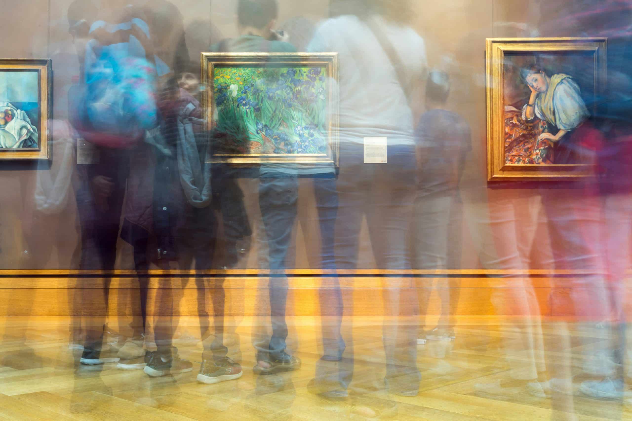 Visitors looking at art