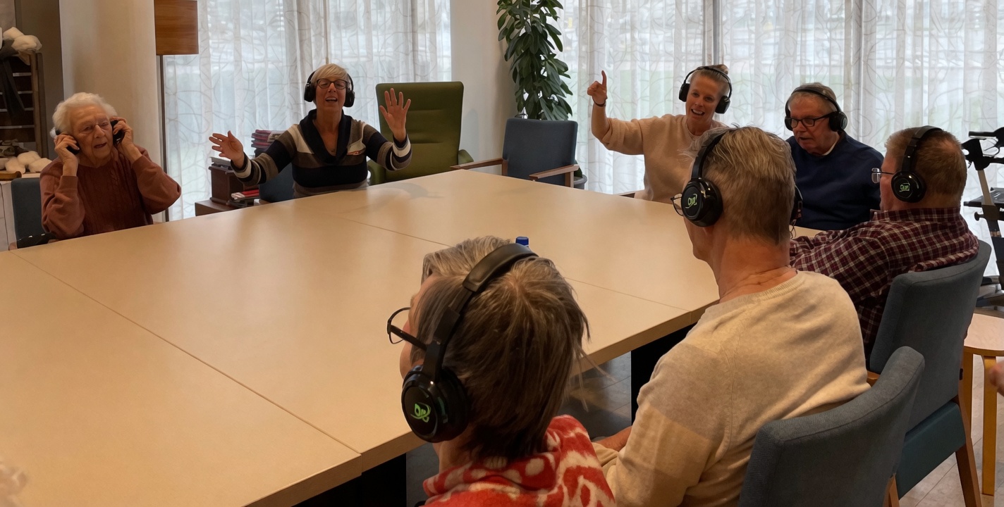 Residents with Dolly Digital headphones